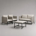 Set divani da giardino 4 pezzi in rattan PE con struttura in alluminio nero cuscini beige tavolino rettangolare design modulare