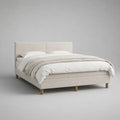 Letto matrimoniale 160 x 200 cm imbottito in tessuto colore beige con testiera rettangolare a pannelli e gambe in legno naturale